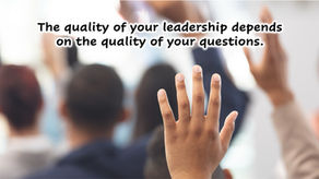 Professionals raising hands to ask questions in meeting representing the power of asking