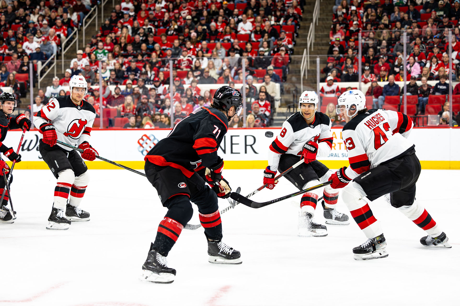 The New Jersey Devils vs. the Carolina Hurricanes, photographed by Christina Winnegar.