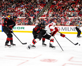 The New Jersey Devils vs. the Carolina Hurricanes, photographed by Christina Winnegar.