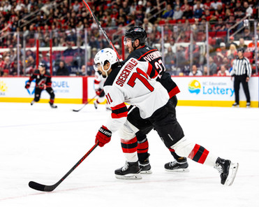 The New Jersey Devils vs. the Carolina Hurricanes, photographed by Christina Winnegar.