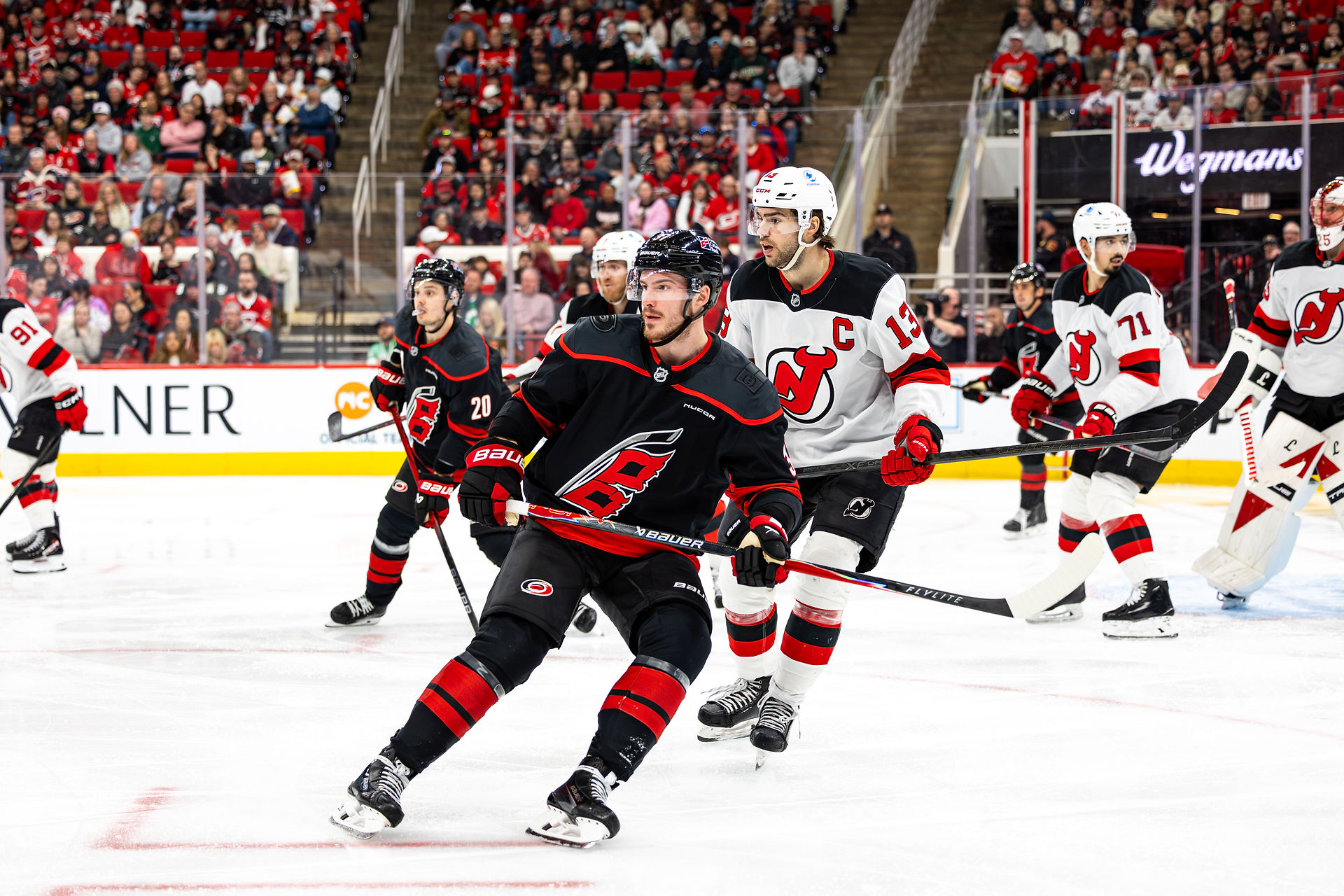 The New Jersey Devils vs. the Carolina Hurricanes, photographed by Christina Winnegar.