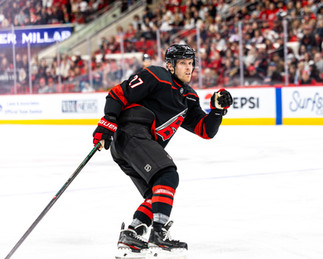 The New Jersey Devils vs. the Carolina Hurricanes, photographed by Christina Winnegar.