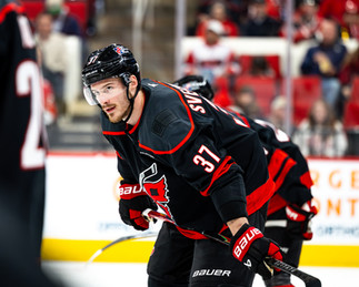 The New Jersey Devils vs. the Carolina Hurricanes, photographed by Christina Winnegar.