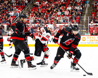 The New Jersey Devils vs. the Carolina Hurricanes, photographed by Christina Winnegar.