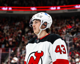 The New Jersey Devils vs. the Carolina Hurricanes, photographed by Christina Winnegar.