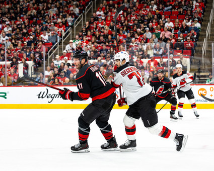 The New Jersey Devils vs. the Carolina Hurricanes, photographed by Christina Winnegar.