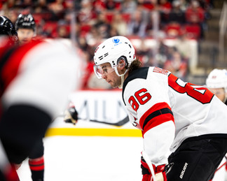 The New Jersey Devils vs. the Carolina Hurricanes, photographed by Christina Winnegar.