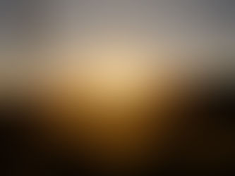 Sun setting over valley