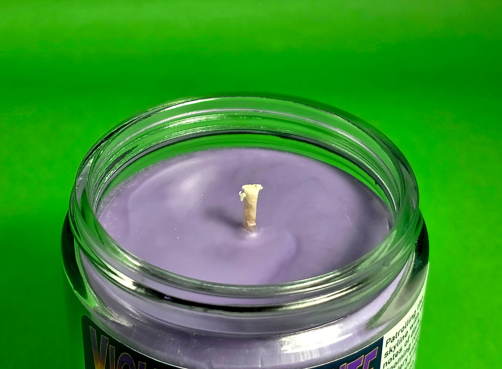 Thumbnail: purple candle on green background