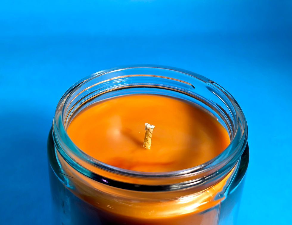 Thumbnail: orange candle on a blue background