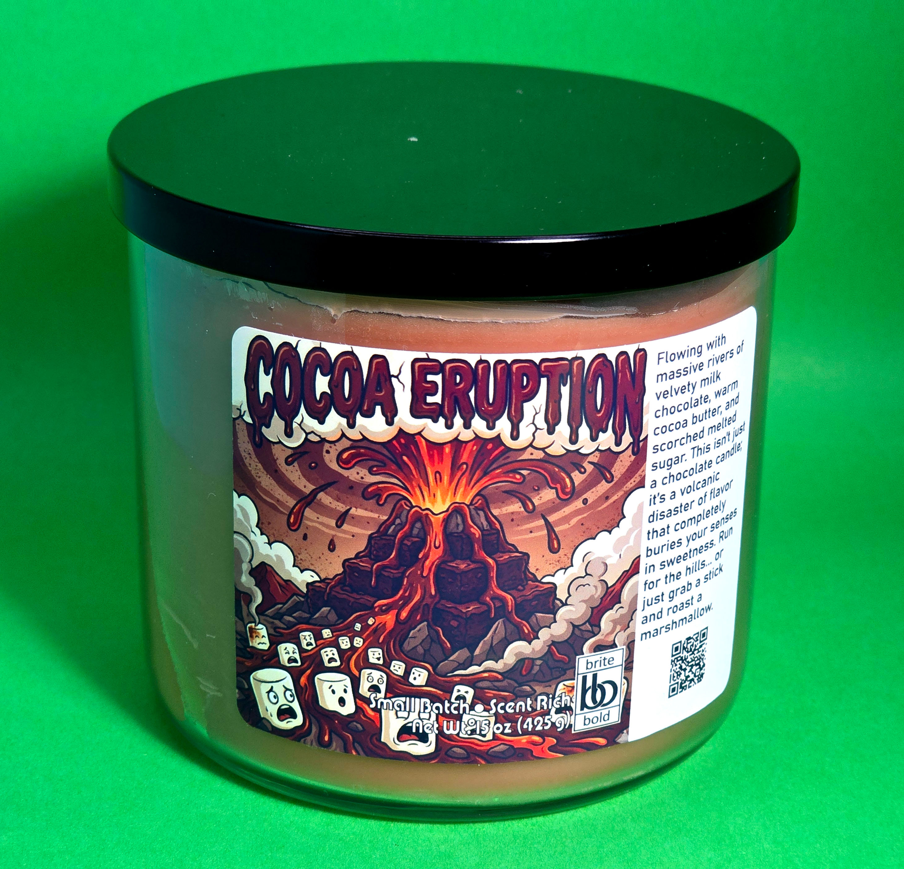 large brown candle on a green table