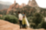 A couple walking in the mountains.