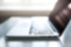 Open laptop. Photo by Nao Triponez on Pexels.