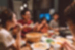 mid 30s asian-american family having dinner
