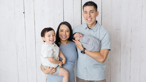 family with newborn in studio