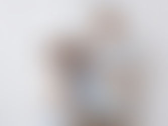 family with newborn in studio