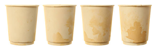 A sequence of the same low‑quality disposable paper cup shown at four stages over time, gradually soaking, staining and deforming as liquid seeps through to illustrate how poor cup quality leads to leaking and structural failure.