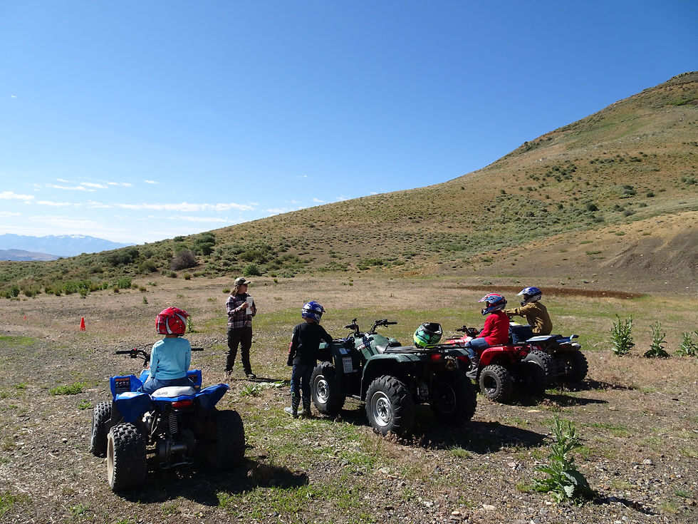 Class of youth ATV students listening to an instructor