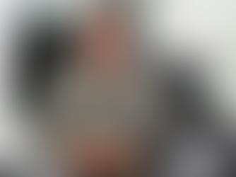 A man holding a tourniquet device