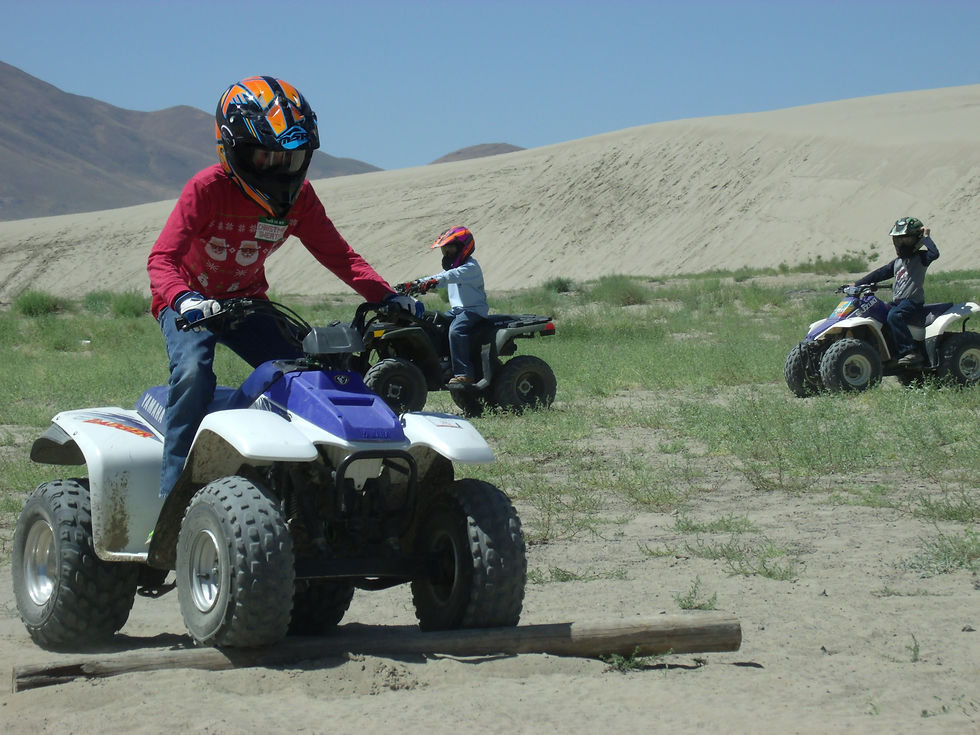 Youth ATV riders on a safety training course