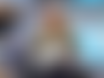 a woman holding an aluminum bowl and plate