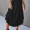 Thumbnail: Solid Shirred Waist Asymmetrical Hem Flared Skirt