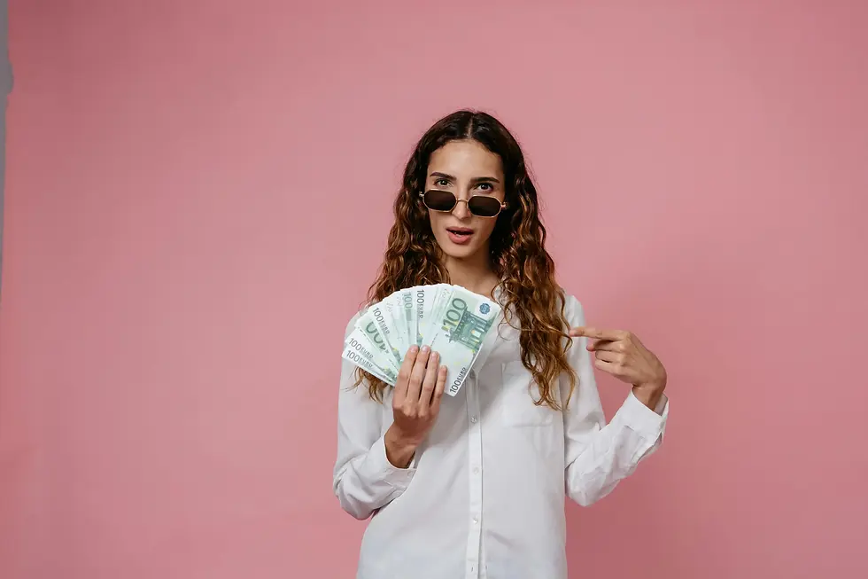 woman wearing sunglasses and white shirt holding a lot of money