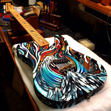 Collaboration with Dale Wilson, Master Builder with Fender Guitars. I did the custom paint, as well as fret inlays.