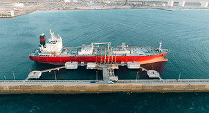 Cargo vessel at port quay during loading operations
