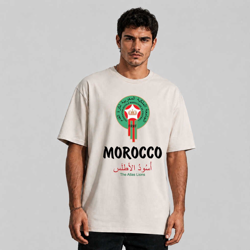 Man wearing a white Morocco national team t-shirt.