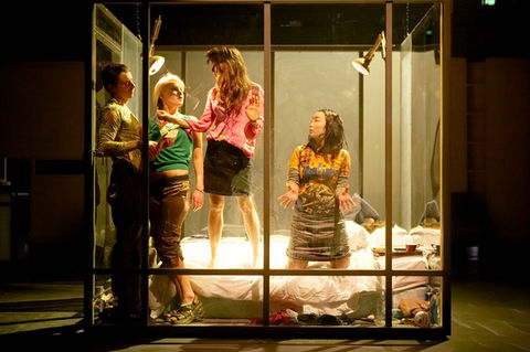 Four young adult actors in a glass house