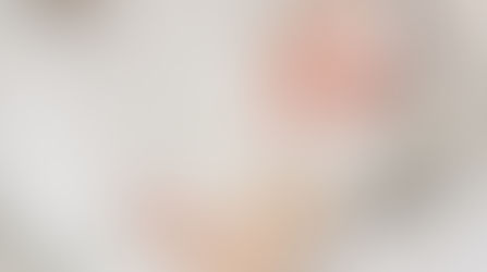 Mom and newborn baby girl after empowering homebirth with Mindful Birth