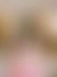 Mother holding newborn after a quick unmedicated VBAC at NCH with doula support