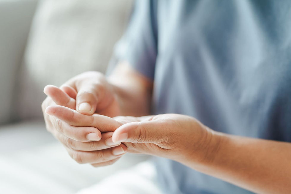 A Person Experiencing Finger Pain or Pain in Fingertips.