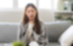 A Young Woman Experiencing Sore Throat on One Side.