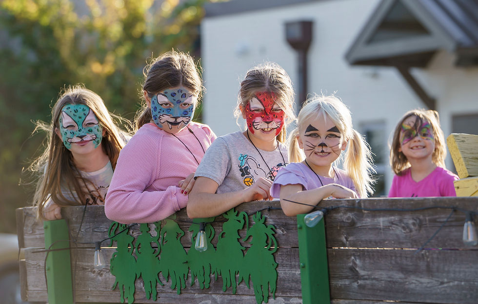 Painted faces in the wagon.
