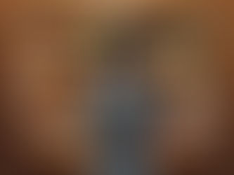 person opening a kitchen cabinet that is fully stacked with ingredients for healthy cooking