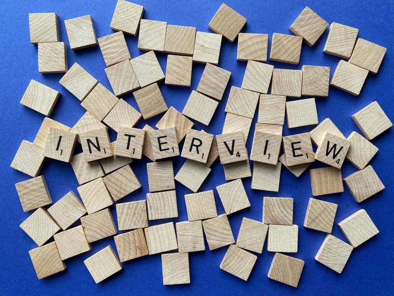 Scrabble tiles spell the word "interview"