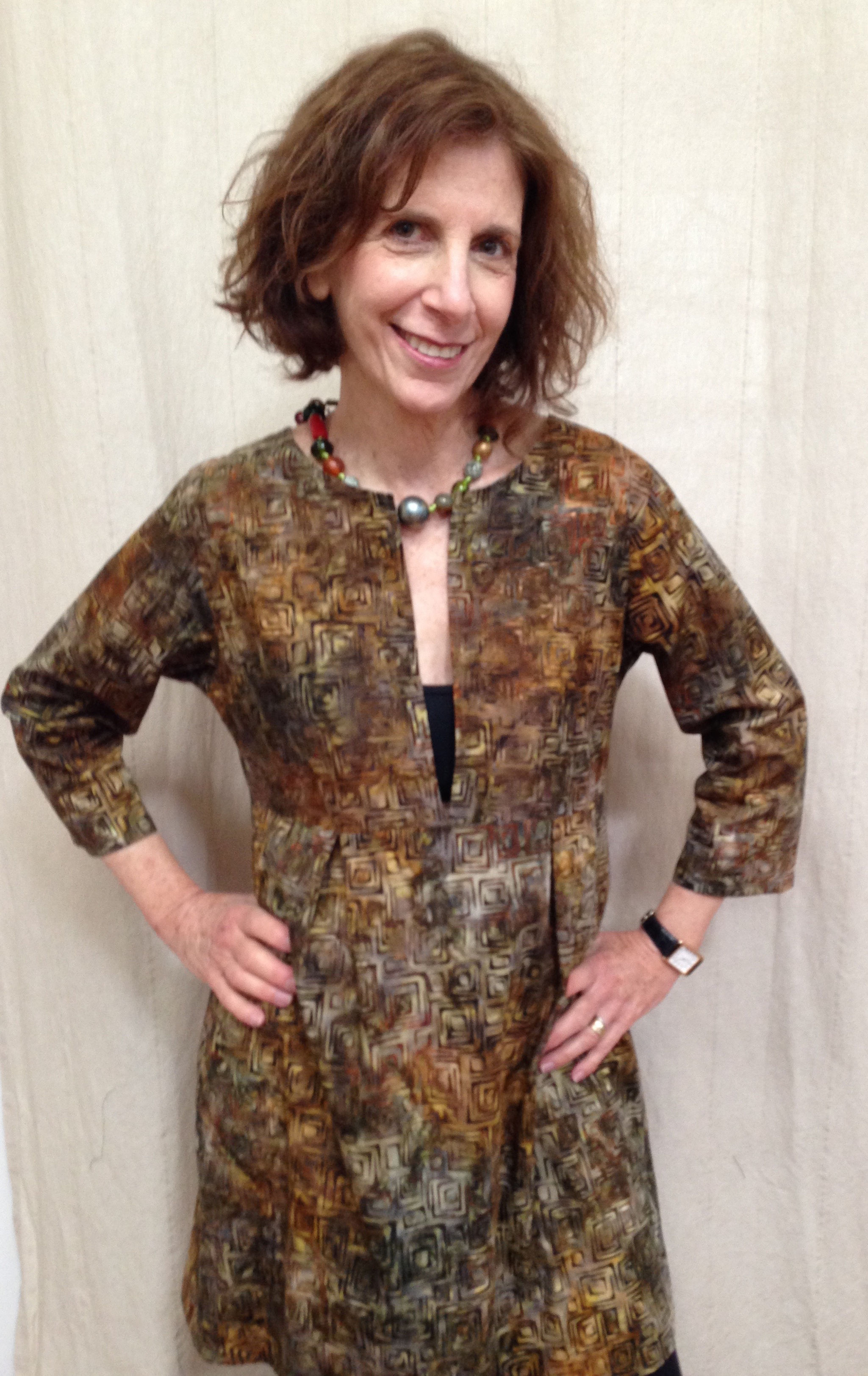 Illuminated gold and brown tunic