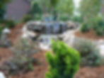 Waterfall with Sculpture