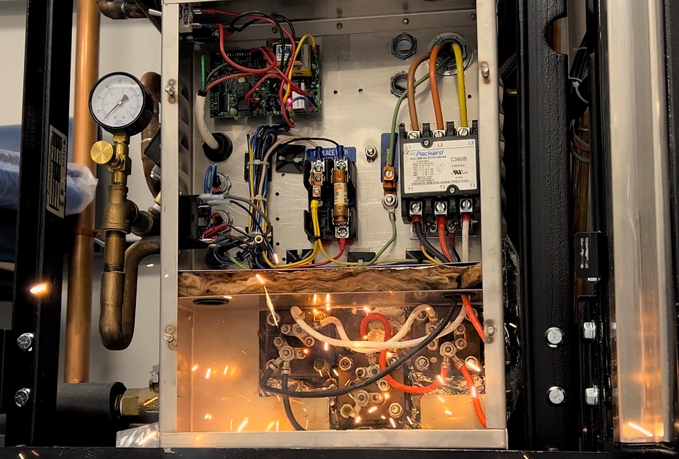 Electrical sparking inside a commercial steam boiler