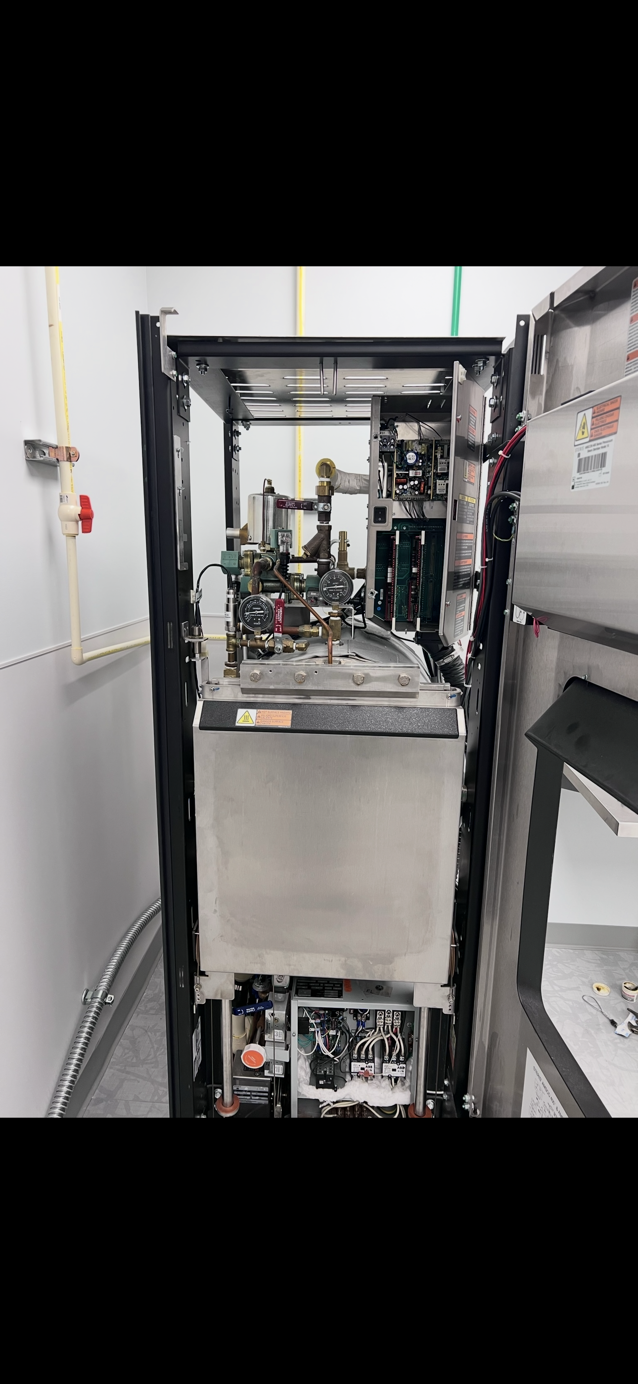 Open washer-disinfector during maintenance