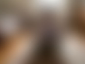 A little boy reading a book about witches