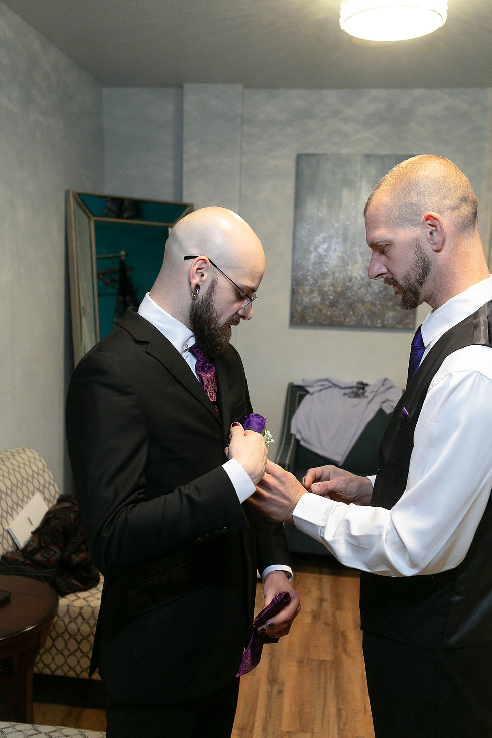 Two brothers getting ready for the wedding