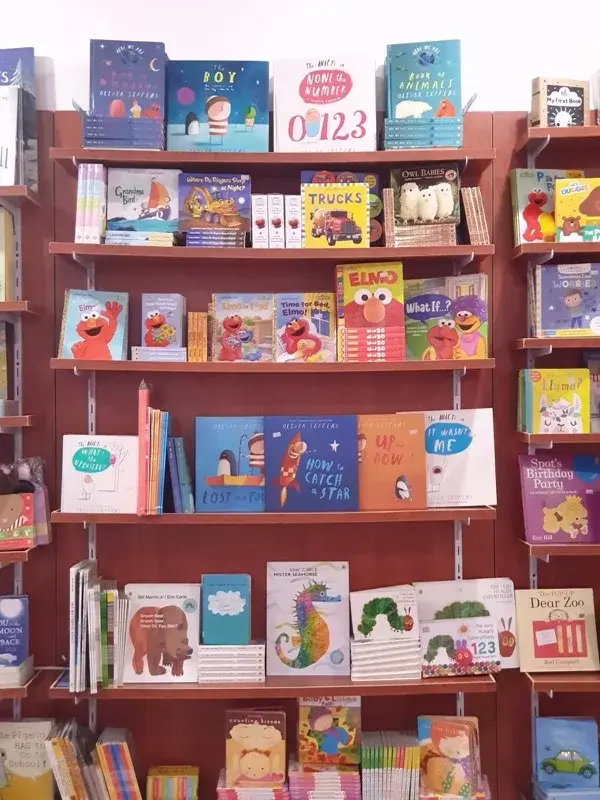 Shelves of books at Little Bees