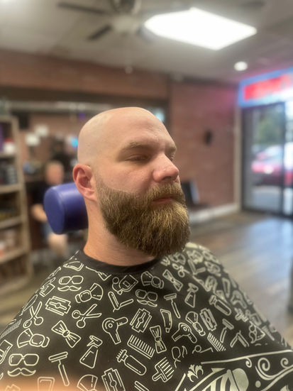 photo of a freehand beard trim with a fade and lineup.