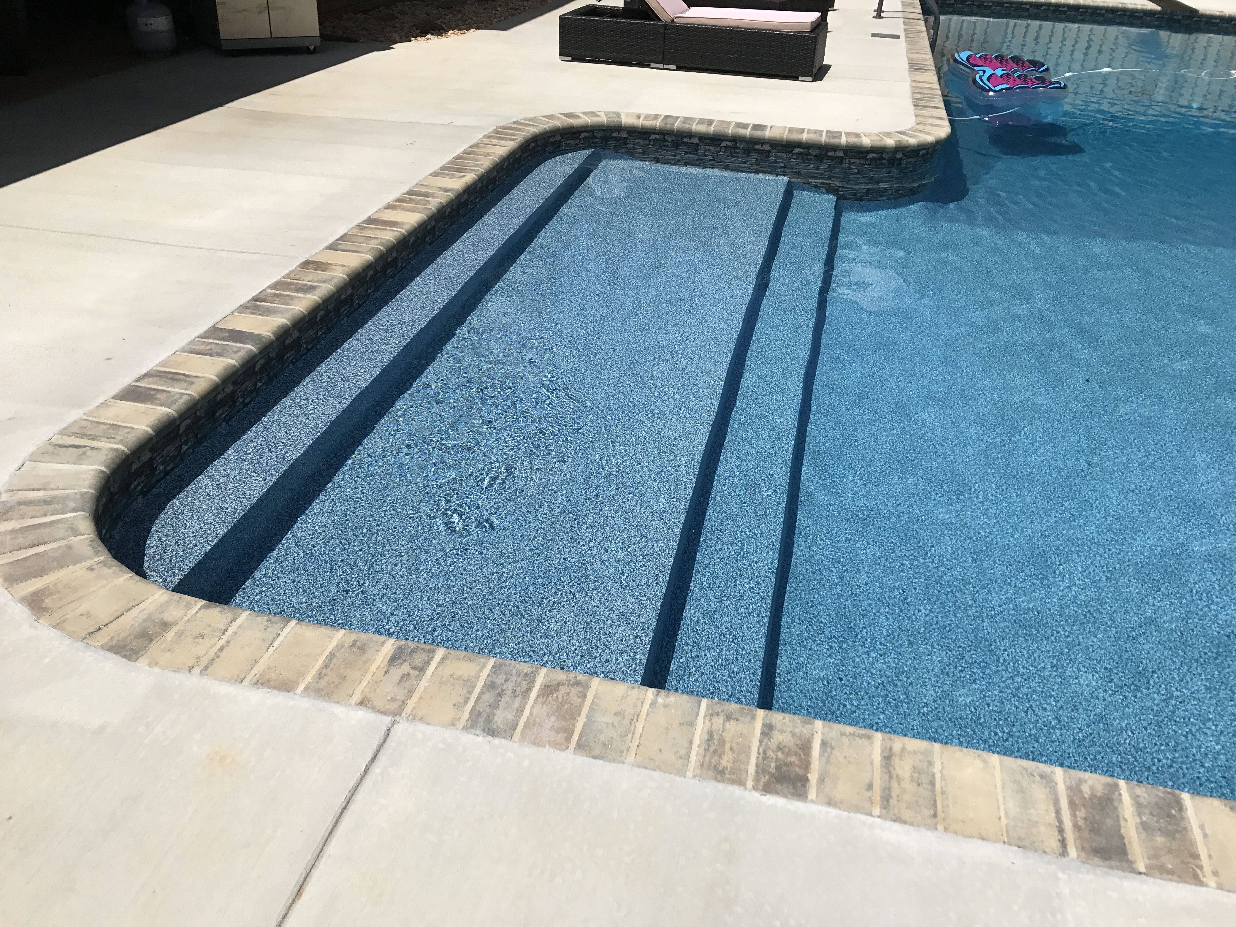 20 x 43 L Shape With Tanning Ledge Step