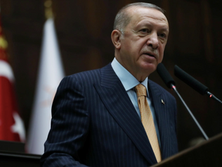 Erdogan warns of military action in Syria, decries Russian strike