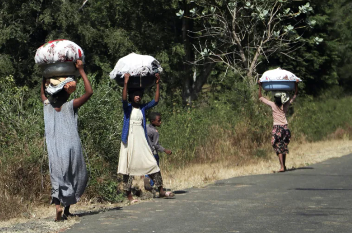 Aid groups said they were concerned about protection of children, women, the elderly and disabled people amid the military clashes [Tiksa Negeri/Reuters]