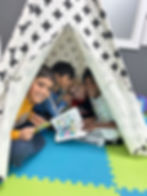 Educator supporting a child with research-based literacy strategies that go beyond traditional tutoring.